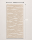 A rectangular beige rug with a wavy, textured pattern, shown with dimension lines indicating 20 inches in width and 40 inches in height.
