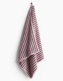Striped towel hanging on a white background