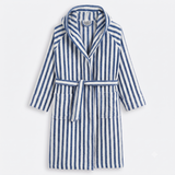 A blue and white vertically striped bathrobe with a shawl collar, tie belt, and front patch pockets, shown flat against a light gray background.